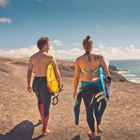 - Agua - Surf & Yoga *