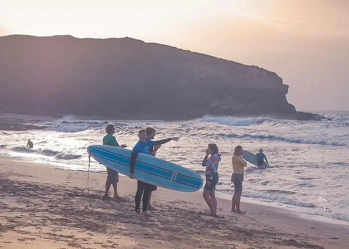 - Agua - Surf & Yoga *